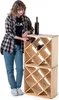 A woman is standing next to a wooden wine rack, placing a bottle into it. Voir les images du produit