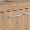 A close-up view of wooden cabinet doors with silver handles. Produktbild-Vorschau