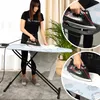A woman is ironing clothes on an ironing board, with close-up shots of the iron and ironing board. Produktbild-Vorschau