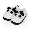 A pair of panda-themed slippers on a white background. Produktbild-Vorschau