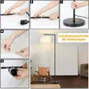 A collage of images showing the assembly steps of a floor lamp, alongside a lifestyle shot of the assembled lamp in a room with furniture. Produktbild-Vorschau