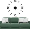 A wall clock with Roman numerals is displayed above a green sofa with white cushions. Náhľad obrázku produktu