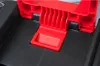 A close-up view of a red and black tool box latch mechanism. Náhľad obrázku produktu