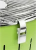 A close-up view of a green charcoal grill, focusing on the latch mechanism and the grill grate. Náhled obrázku produktu