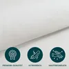 A close-up of white fabric with three circular icons and text below them. Produktbild-Vorschau