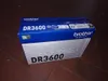 A product box for a Brother DR3600 drum unit is placed on a tiled floor. Náhled obrázku produktu