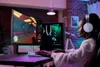 A person playing a video game on a computer. Produktbild-Vorschau