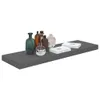 A collection of decorative bottles and books on a shelf. Produktbild-Vorschau