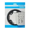 A product shot of a Shimano chainring in its retail packaging. Produktbild-Vorschau