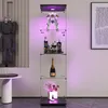 A display cabinet with various items, including a model, a bottle of champagne, and flowers, illuminated by purple lighting. Náhled obrázku produktu