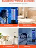 Collage of four scenes showing a lava lamp in different settings: a sensory room with a child, a nursing home room, a living room with a cat, and a bedroom. Voir les images du produit