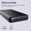 A black power bank is shown at an angle, with text and icons describing its features. Produktbild-Vorschau