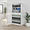 A white metal filing cabinet with its doors open, filled with binders and office supplies, in a bright, modern office setting. Náhled obrázku produktu