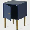 A blue nightstand with a patterned door and gold legs. Podgląd zdjęcia produktu