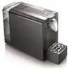 A studio shot of a coffee capsule machine. Voir les images du produit