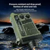 A green emergency radio is shown in a dark, rainy environment with water splashing around it. Produktbild-Vorschau