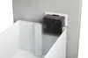 A close-up view of a white drawer insert with a dark gray plastic component attached to the side. Voir les images du produit