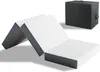 A folded mattress and its storage bag are shown against a white background. Produktbild-Vorschau