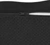 A close-up view of a black cushion, showing a zipper and the textured underside. Podgląd zdjęcia produktu