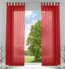 A pair of red sheer curtains hanging in front of a window with a view of a tree and sky. Produktbild-Vorschau