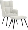 A cream-colored armchair and ottoman with black legs against a white background. Náhled obrázku produktu