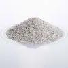 A pile of aquarium gravel on a clear glass plate. Produktbild-Vorschau