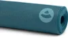 A rolled-up teal yoga mat with a logo on it. Produktbild-Vorschau
