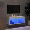 A modern living room with a wall-mounted TV and a white TV stand with blue LED lighting. Anteprima dell’immagine prodotto