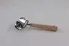 A ravioli cutter with a wooden handle is placed on a white background. Produktbild-Vorschau