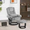 A gray recliner chair and ottoman are shown in a room with a bookshelf in the background. Produktbild-Vorschau
