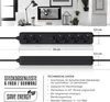 A black power strip with multiple outlets is shown on a desk with a computer monitor and lamp in the background. Podgląd zdjęcia produktu