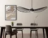 A dining room setting with a table, chairs, and a pendant light. Podgląd zdjęcia produktu