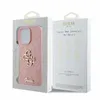 A product package for a pink glitter phone case with a gold Guess logo. Voir les images du produit