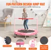 A young girl is jumping on a pink trampoline indoors, with various product features highlighted by text and inset images. Produktbild-Vorschau