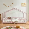 A child's bed with a house frame, decorated with a banner and a picture on the wall. Anteprima dell’immagine prodotto
