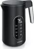 A black electric kettle with a digital display and silver handle, shown from a slightly elevated side angle against a white background. Podgląd zdjęcia produktu
