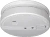 A white smoke detector is shown from a slightly elevated diagonal angle against a white background. Produktbild-Vorschau