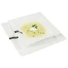 Two square white plates, one stacked on top of the other, with the top plate containing soup and a garnish. Náhled obrázku produktu