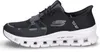 A side view of a black Skechers Glide-Step Pro sneaker with a white sole. Voir les images du produit