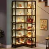 A corner bookshelf filled with various items, including bottles, glasses, and decorative objects, illuminated by soft lighting. Náhled obrázku produktu