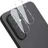 A close-up shot of a smartphone camera lens protector being applied to a phone. Produktbild-Vorschau
