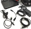 A collection of cables and power adapters for an electronic device, likely a gaming accessory, laid out on a white surface. Anteprima dell’immagine prodotto