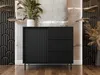 A modern black dresser with fluted doors and drawers is placed in a stylish room with decorative wall panels and lighting. Voir les images du produit