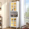 A white corner cabinet with glass doors and LED lighting, placed in a room with natural light coming from a window. Produktbild-Vorschau