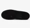 The bottom view of a black Nike sneaker. Podgląd zdjęcia produktu