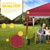 An elderly man and a young girl are sitting on a bench under a red pop-up gazebo in a grassy park. Náhľad obrázku produktu