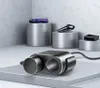 A product shot of a car charger and other accessories displayed on pedestals against a textured wall. Produktbild-Vorschau