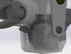 A close-up view of a mechanical component, possibly part of a drone or similar device, with a transparent casing. Voir les images du produit