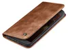 A brown leather flip case for a smartphone is shown against a white background. Produktbild-Vorschau