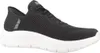 A black Skechers Slip-Ins Go Walk Flex shoe with a white sole, shown from the side against a white background. Náhľad obrázku produktu